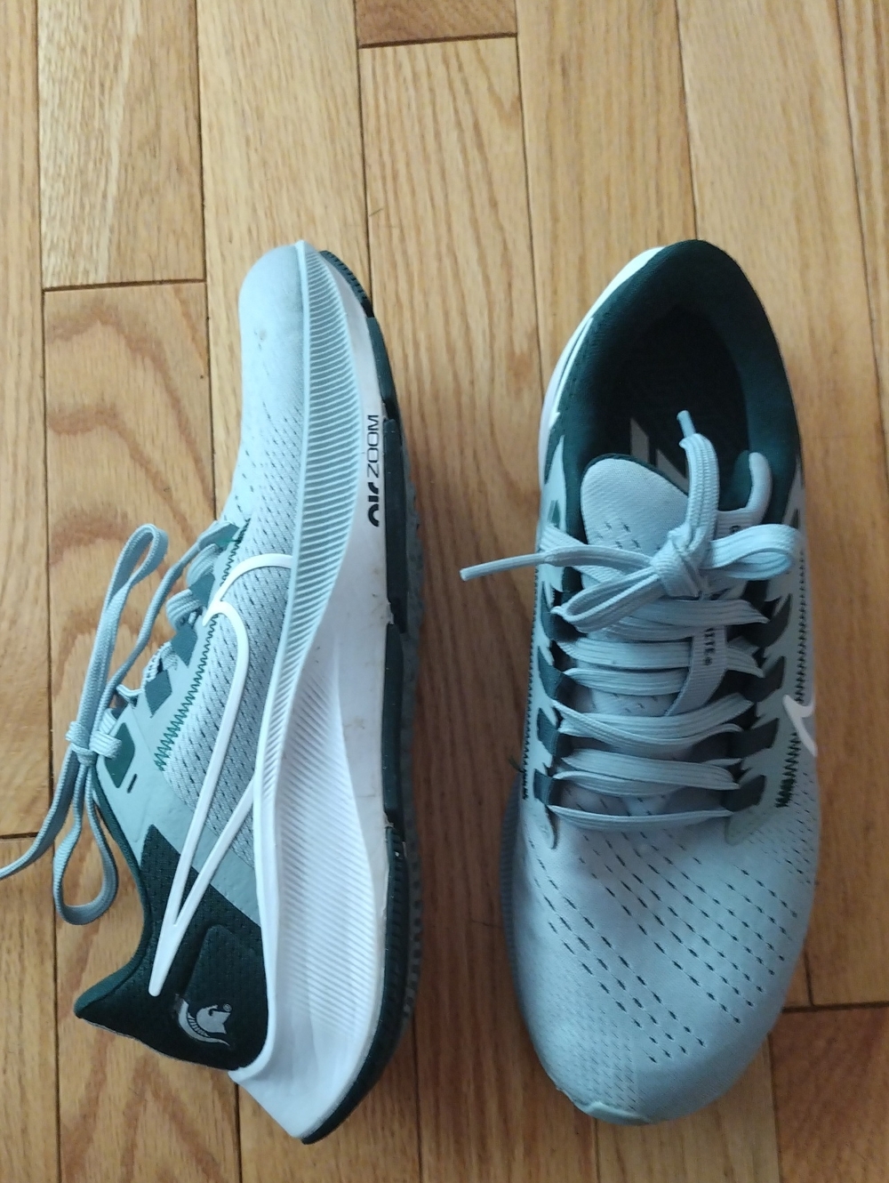 Nike Zoom Kids Light Gray and Dark Green Athletic Sneakers With MSU Emblem